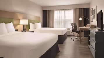 Hypo-allergenic bedding, pillow-top beds, desk, laptop workspace