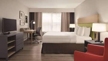 Hypo-allergenic bedding, pillowtop beds, desk, laptop workspace