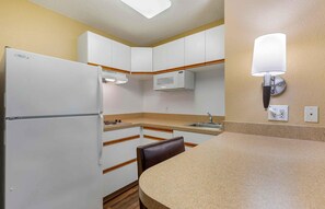 Deluxe Studio | Private kitchen | Full-size fridge, microwave, stovetop, coffee/tea maker