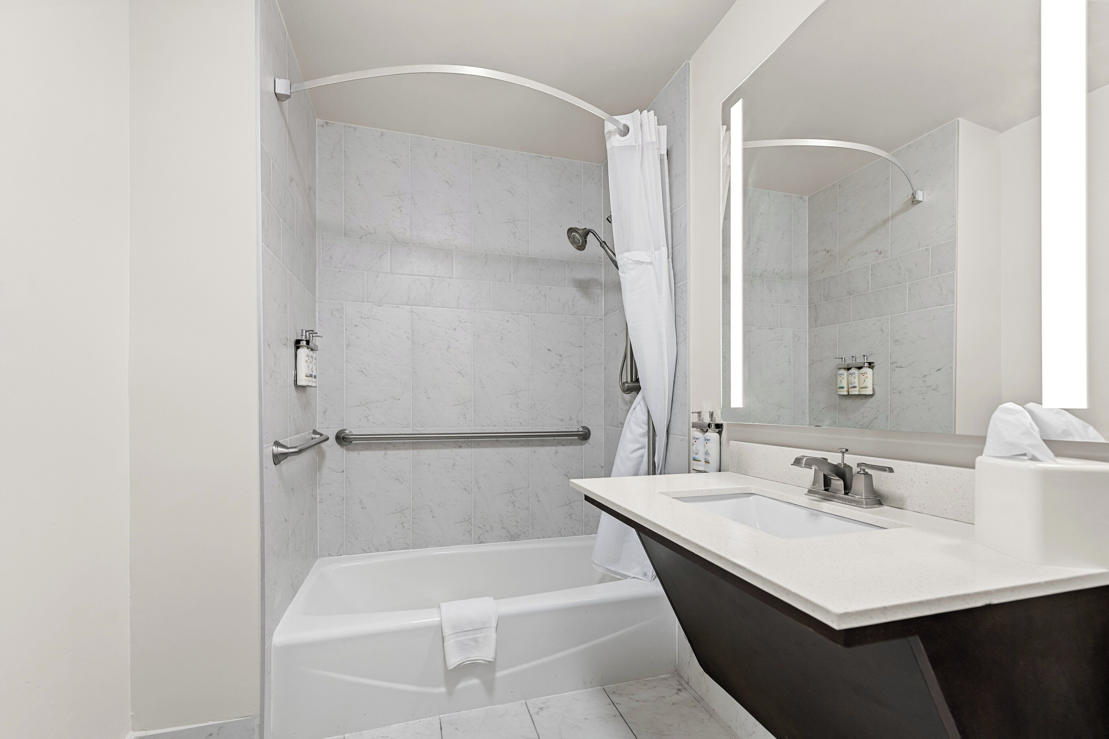 combined shower/bathtub, free toiletries, hair dryer, towels