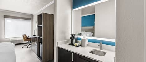 Down comforters, pillowtop beds, in-room safe, desk