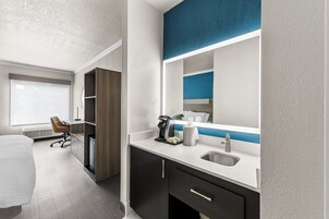 Down comforters, pillowtop beds, in-room safe, desk