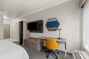 Down duvets, pillow-top beds, in-room safe, desk