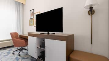 Coffre-fort, rideaux d’obscurcissement, fer et planche à repasser