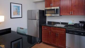 Coffee/tea maker, fridge, microwave, cookware/dishes/utensils