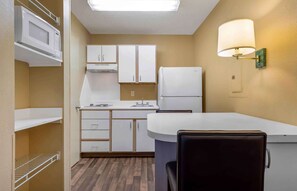 Studio, 1 Queen Bed, Non Smoking | Private kitchen | Fridge, microwave, stovetop, coffee/tea maker