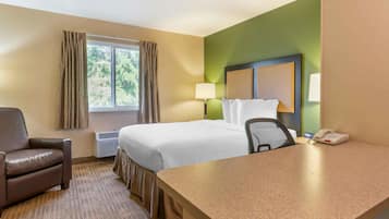 Studio, 1 Queen Bed, Non Smoking | Desk, laptop workspace, blackout drapes, iron/ironing board