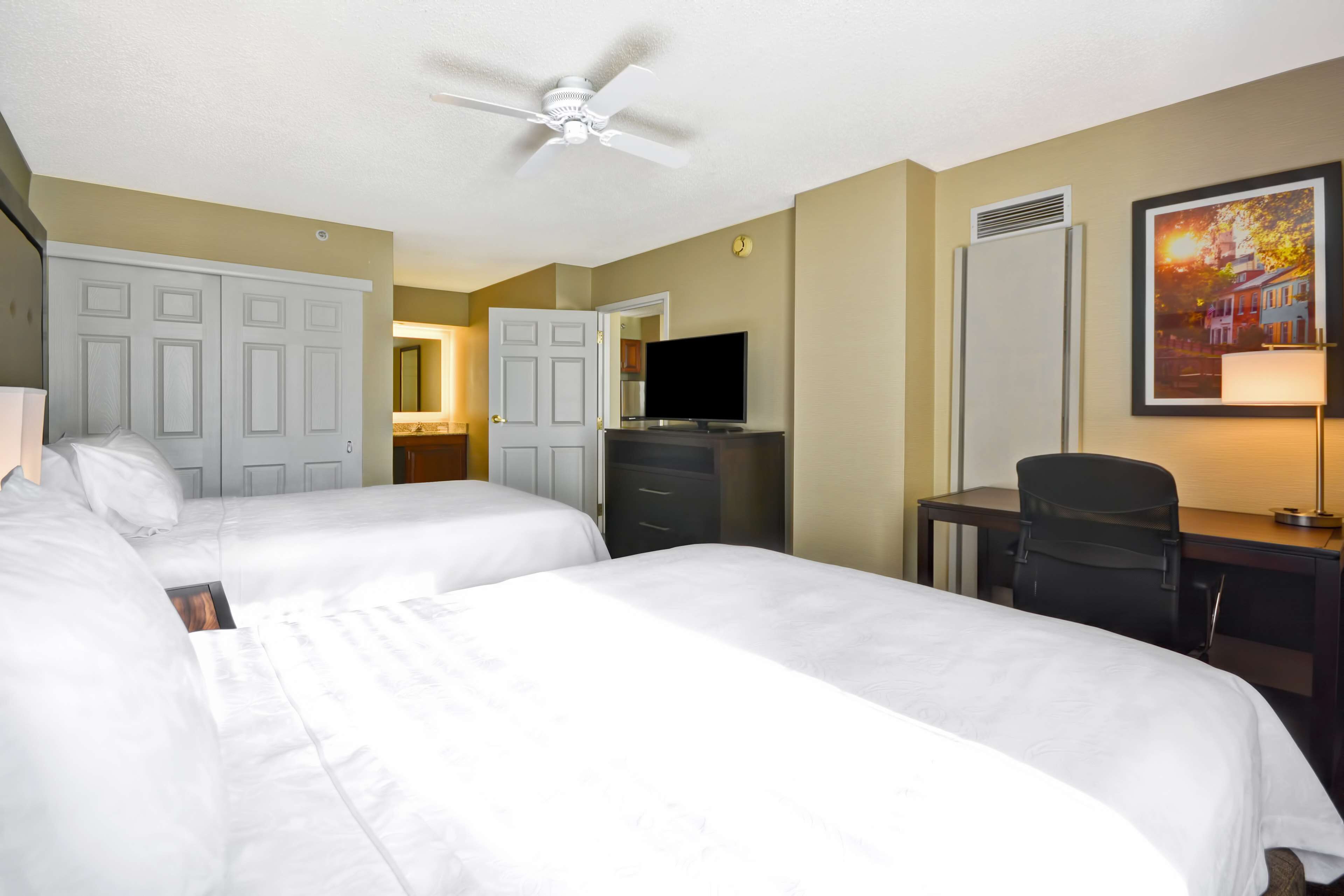 suite, 2 queen beds | 1 bedroom, in-room safe, desk, laptop workspace