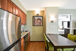 Suite, 2 Bedrooms | Private kitchen | Full-sized fridge, microwave, stovetop, dishwasher