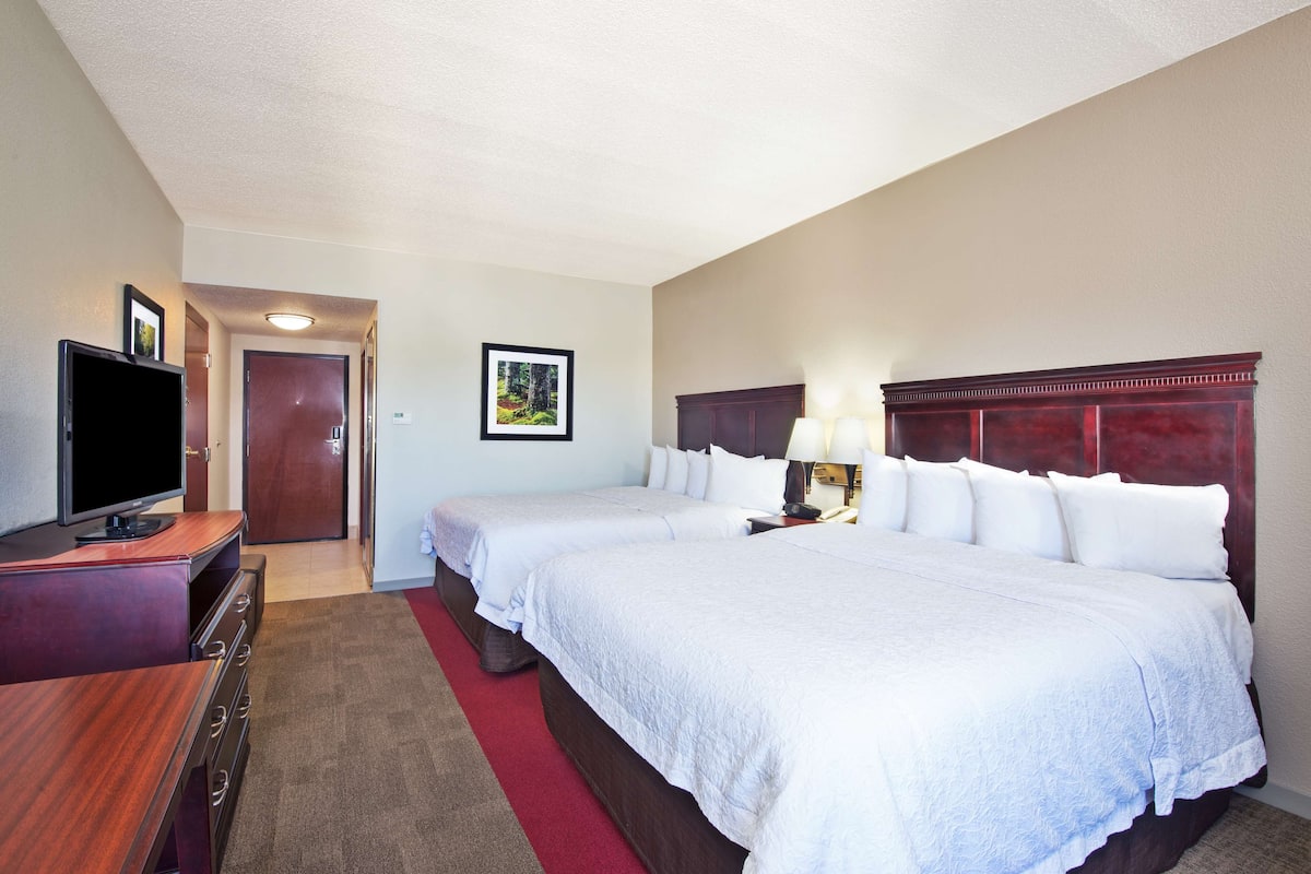 Room, 2 Queen Beds, Non Smoking | In-room safe, iron/ironing board, free cribs/infant beds, rollaway beds