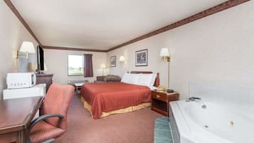 Suite, 1 King Bed with Sofa bed, Smoking | Iron/ironing board, free cribs/infant beds, rollaway beds, free WiFi