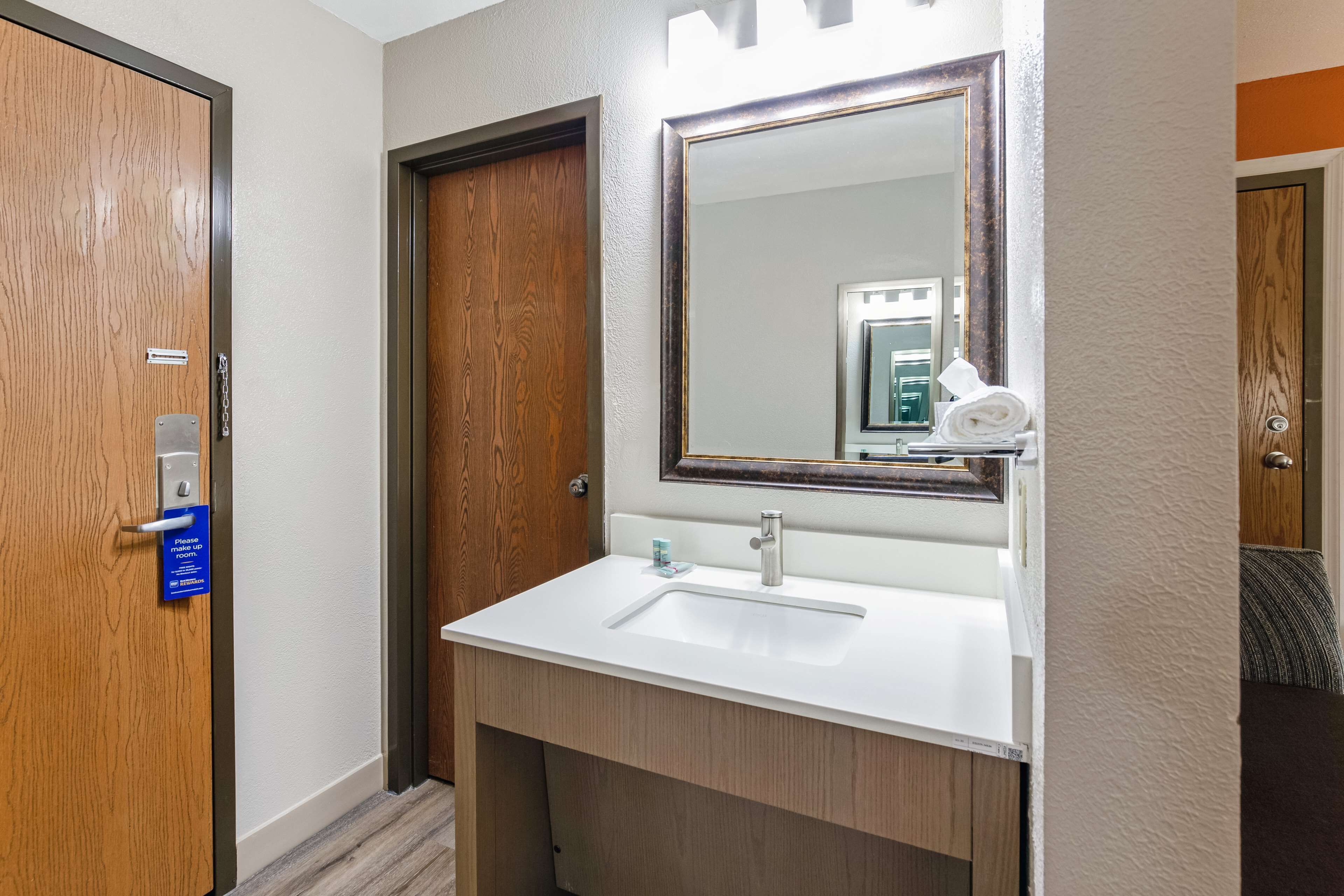 standard room, 1 king bed, non smoking, refrigerator & microwave (walk-in shower) | bathroom | free toiletries, hair dryer, towels, soap