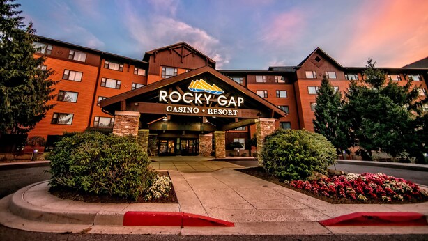 A multi-story building with a prominent sign reading "ROCKY GAP CASINO RESORT". - Rocky Gap Casino & Resort (Cumberland)