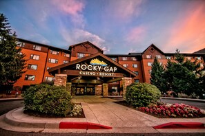 A multi-story building with a prominent sign reading "ROCKY GAP CASINO RESORT". - Rocky Gap Casino & Resort (Cumberland)