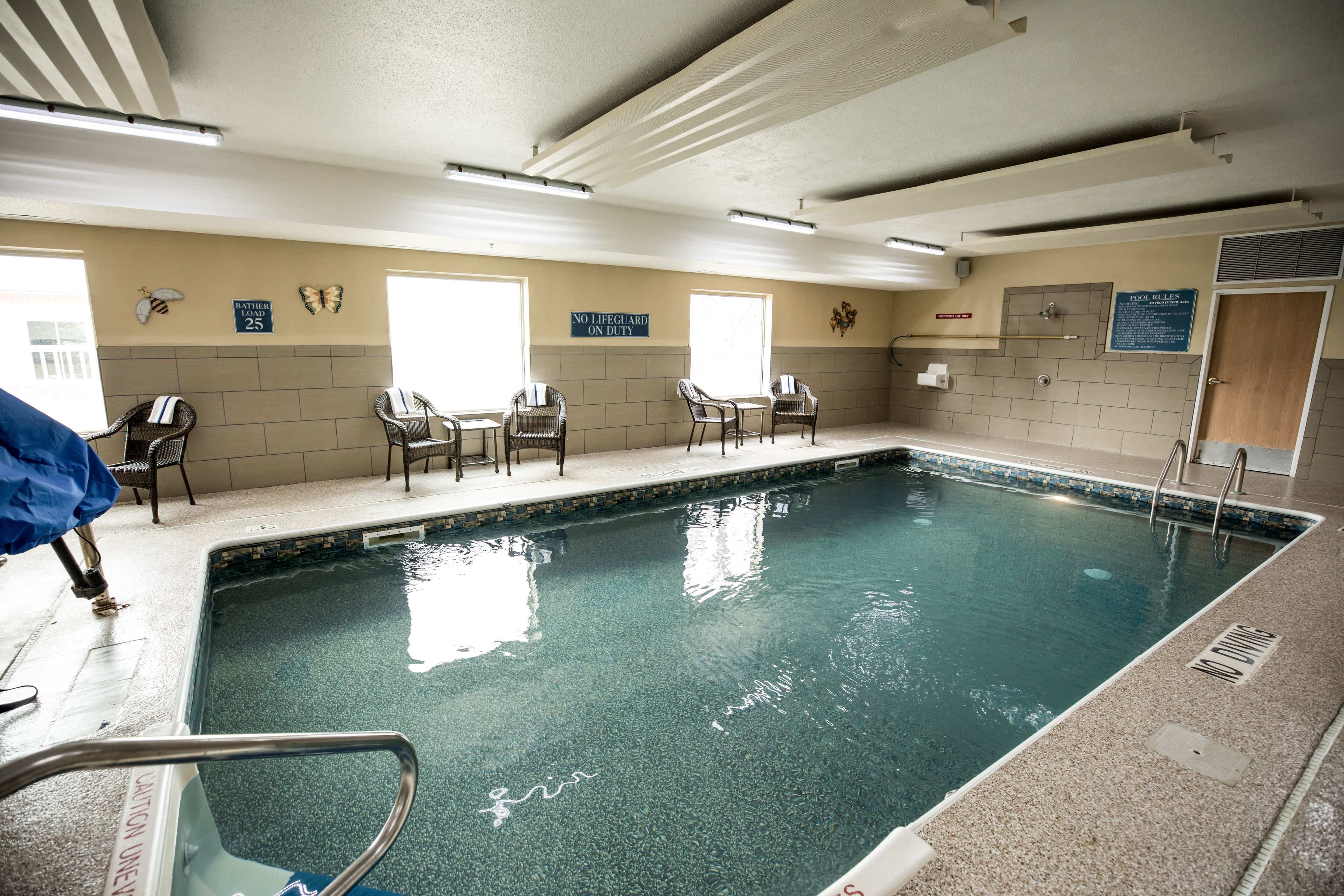 indoor pool, open 8:00 am to 10:00 pm, pool loungers