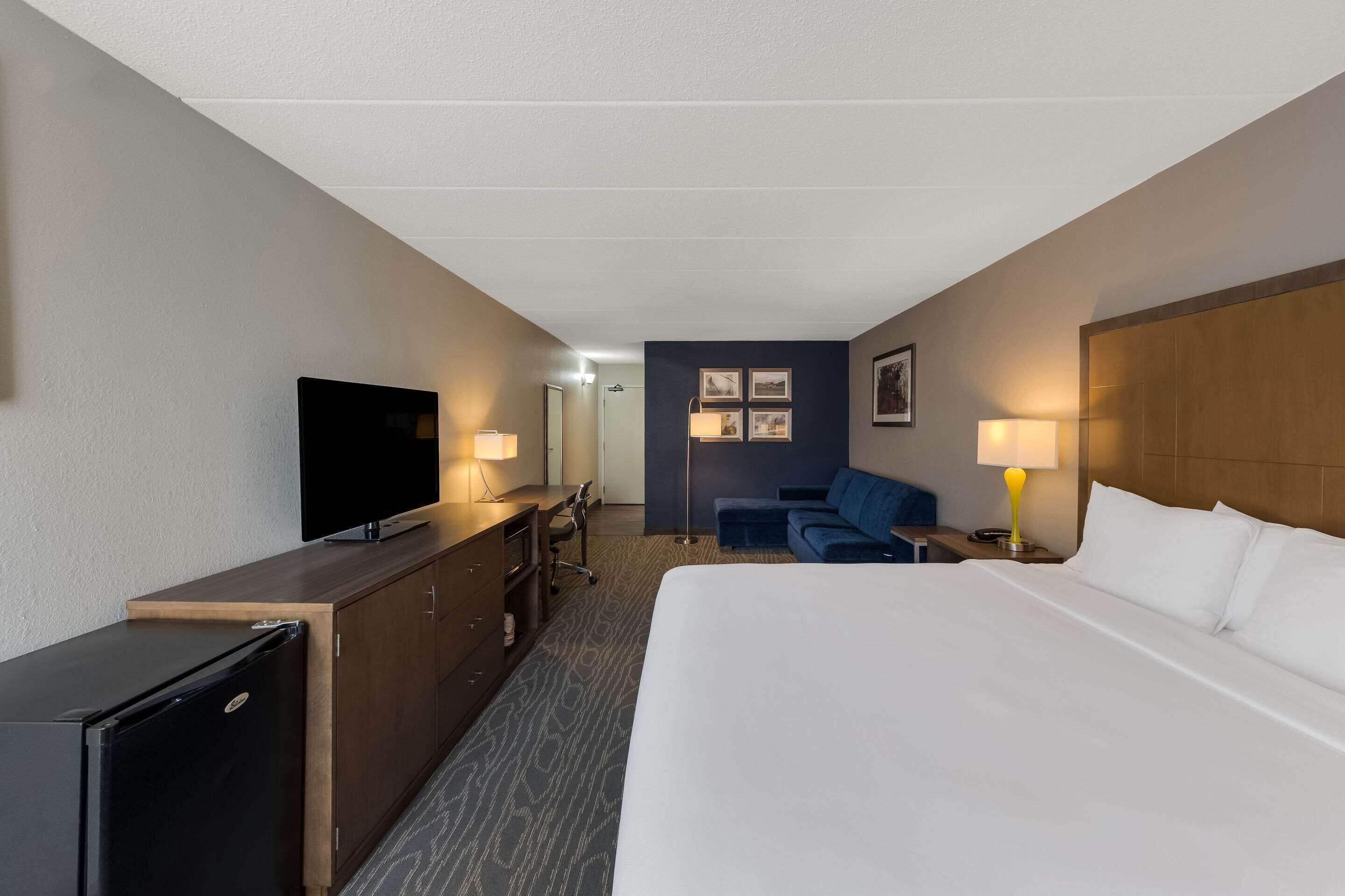 Suite, 1 cama de matrimonio grande, no fumadores | Ropa de cama de alta calidad, escritorio, cortinas opacas