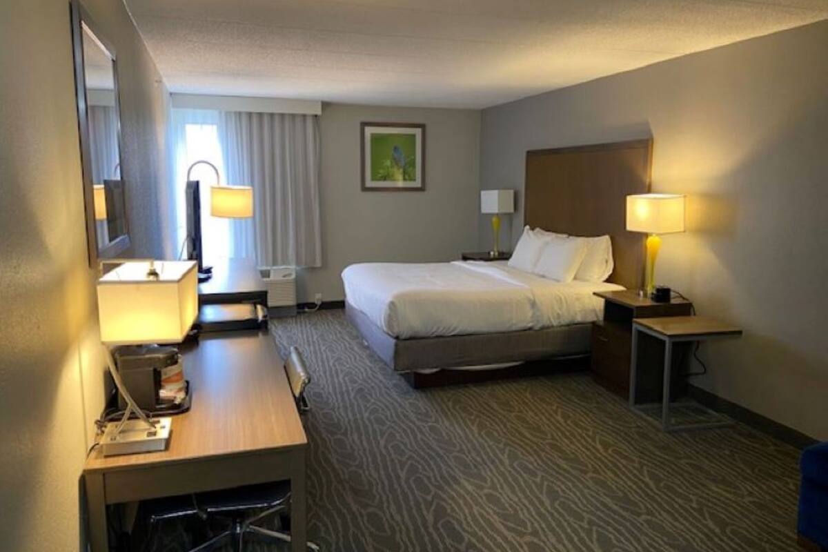 Premium bedding, desk, blackout drapes, soundproofing