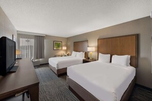 Premium bedding, desk, blackout drapes, soundproofing