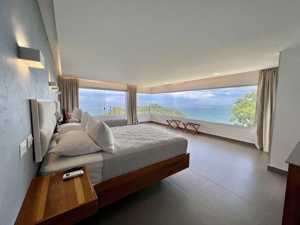 Corner Sunset Ocean View Room | Egyptian cotton sheets, premium bedding, in-room safe, desk