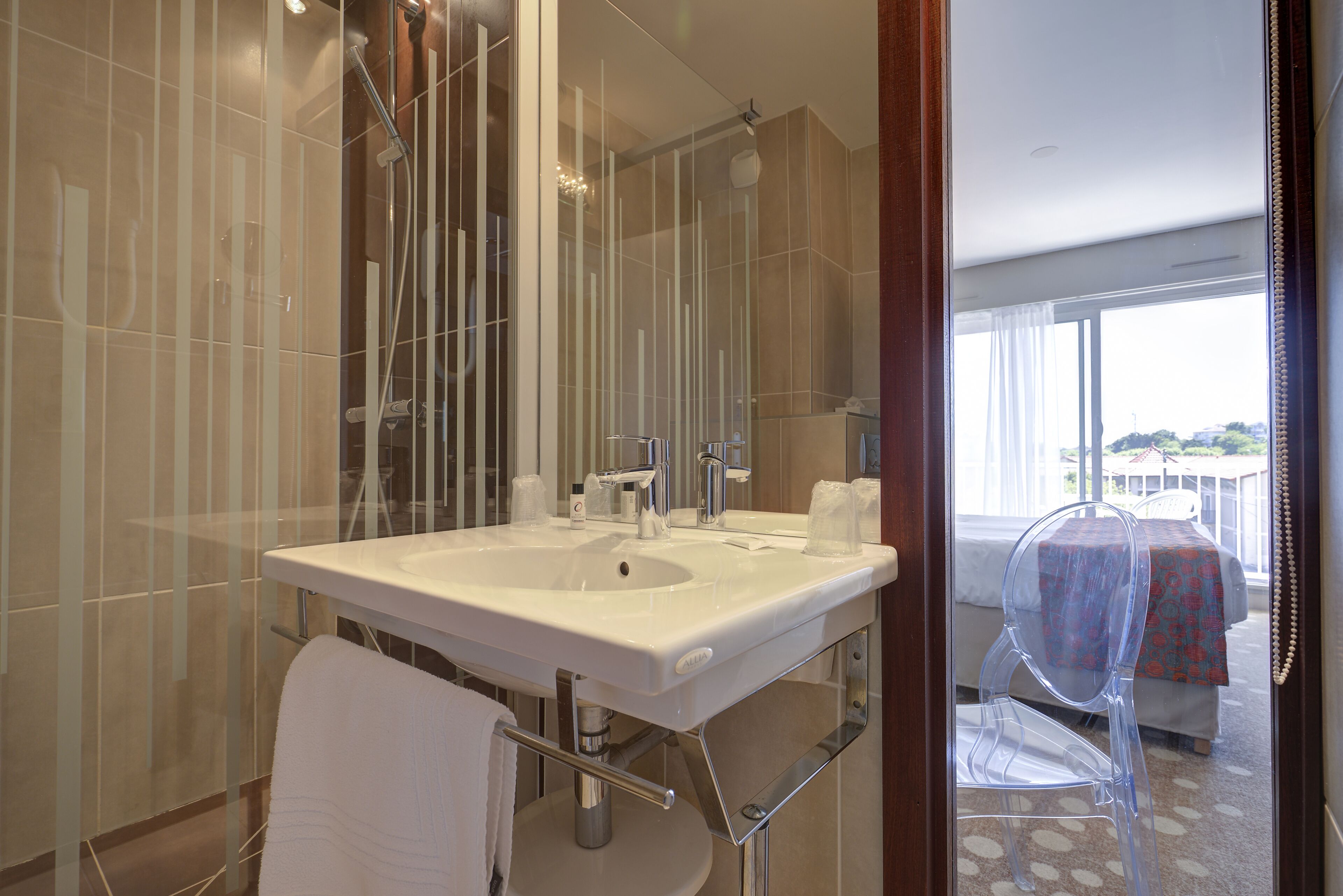 superior double room | bathroom | shower, free toiletries, hair dryer, towels
