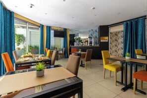 Daily buffet breakfast (EUR 14 per person)