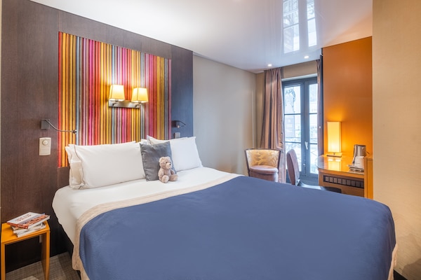 Rum - anslutande rum | Sängtillbehör av högsta kvalitet och minibar