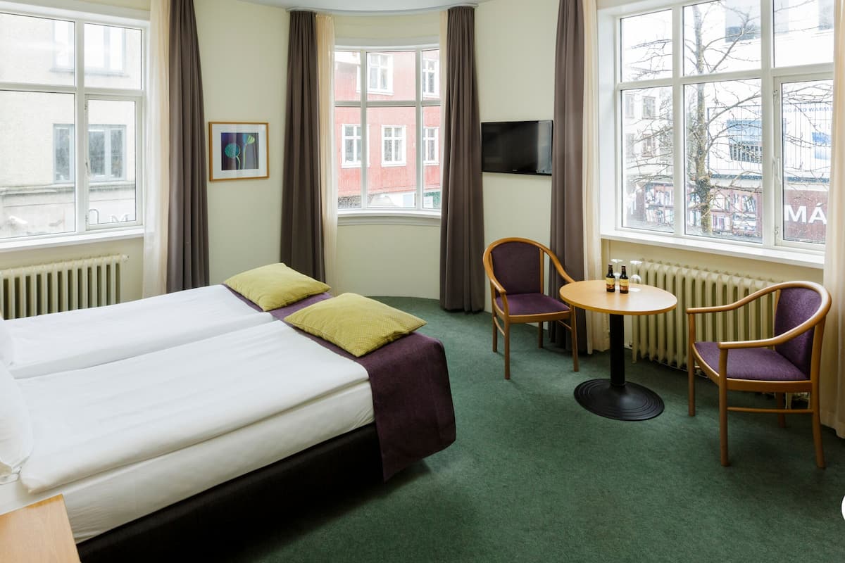 superior double or twin room | minibar, desk, laptop workspace, blackout curtains