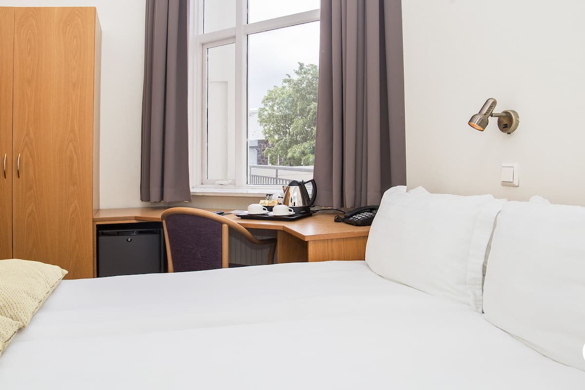 minibar, desk, laptop workspace, blackout curtains