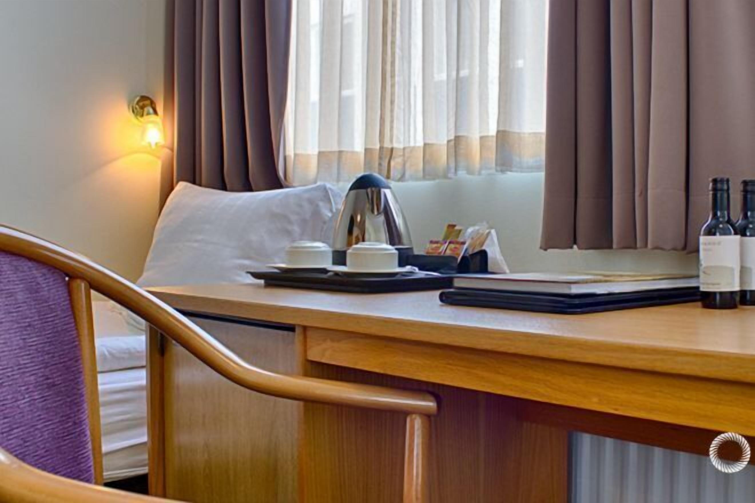 Minibar, desk, laptop workspace, blackout curtains