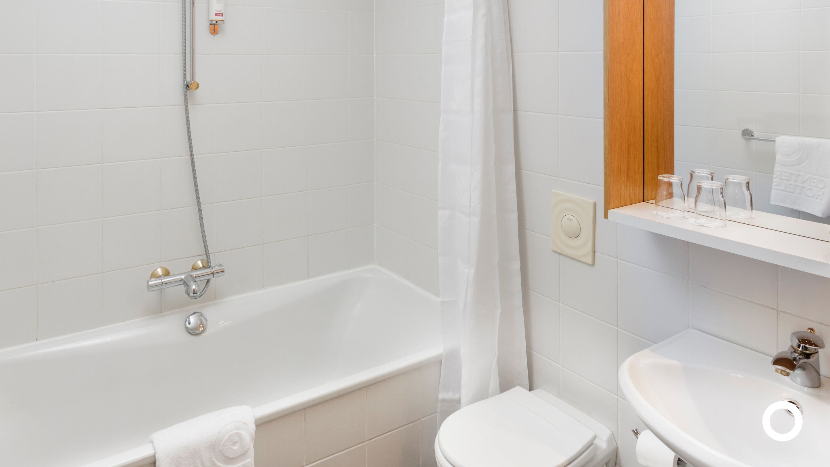 eco-friendly toiletries, hair dryer, towels