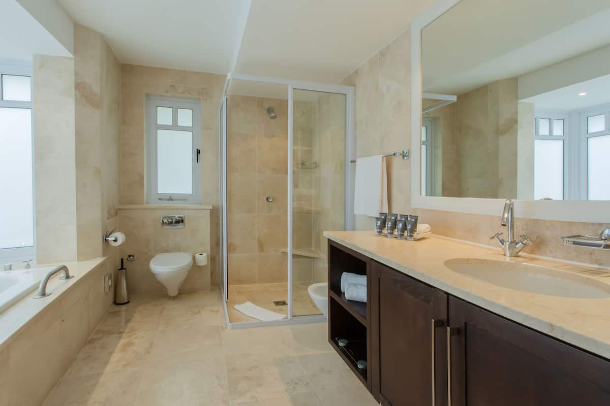 luxury room | bathroom | separate bathtub and shower, deep-soaking bathtub, free toiletries