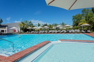 2 indoor pools, 2 outdoor pools, open 6:00 AM to 6:00 PM, pool umbrellas
