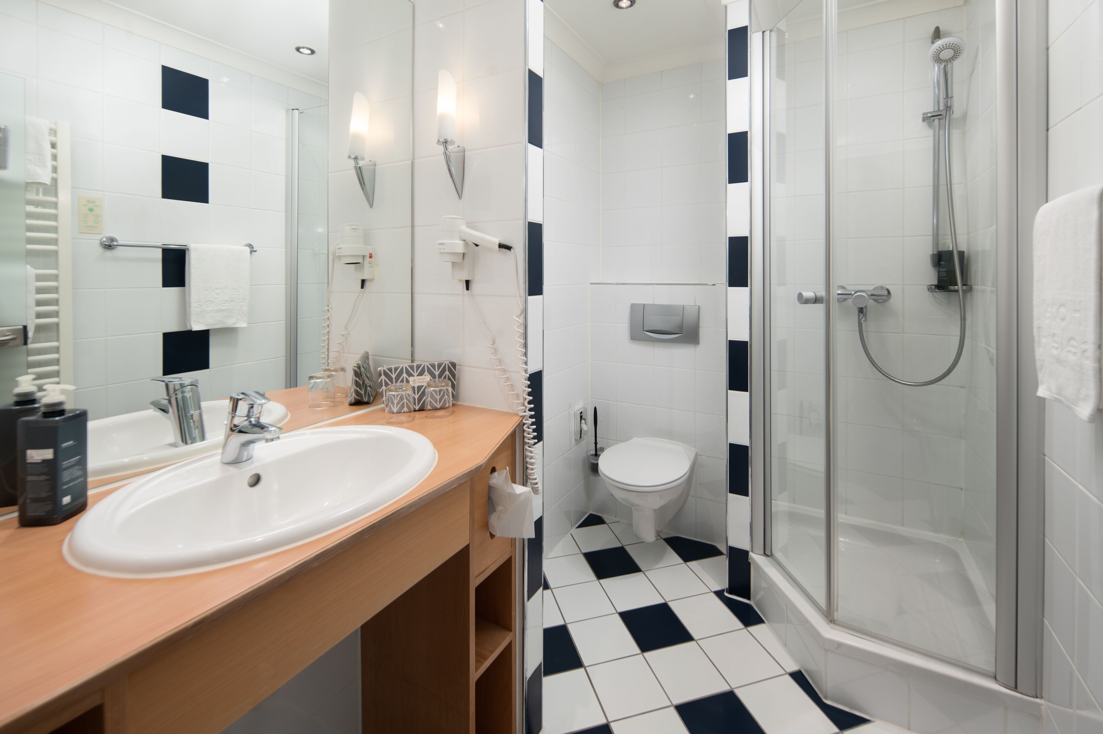 superior room | bathroom | eco-friendly toiletries, hair dryer, bathrobes, slippers