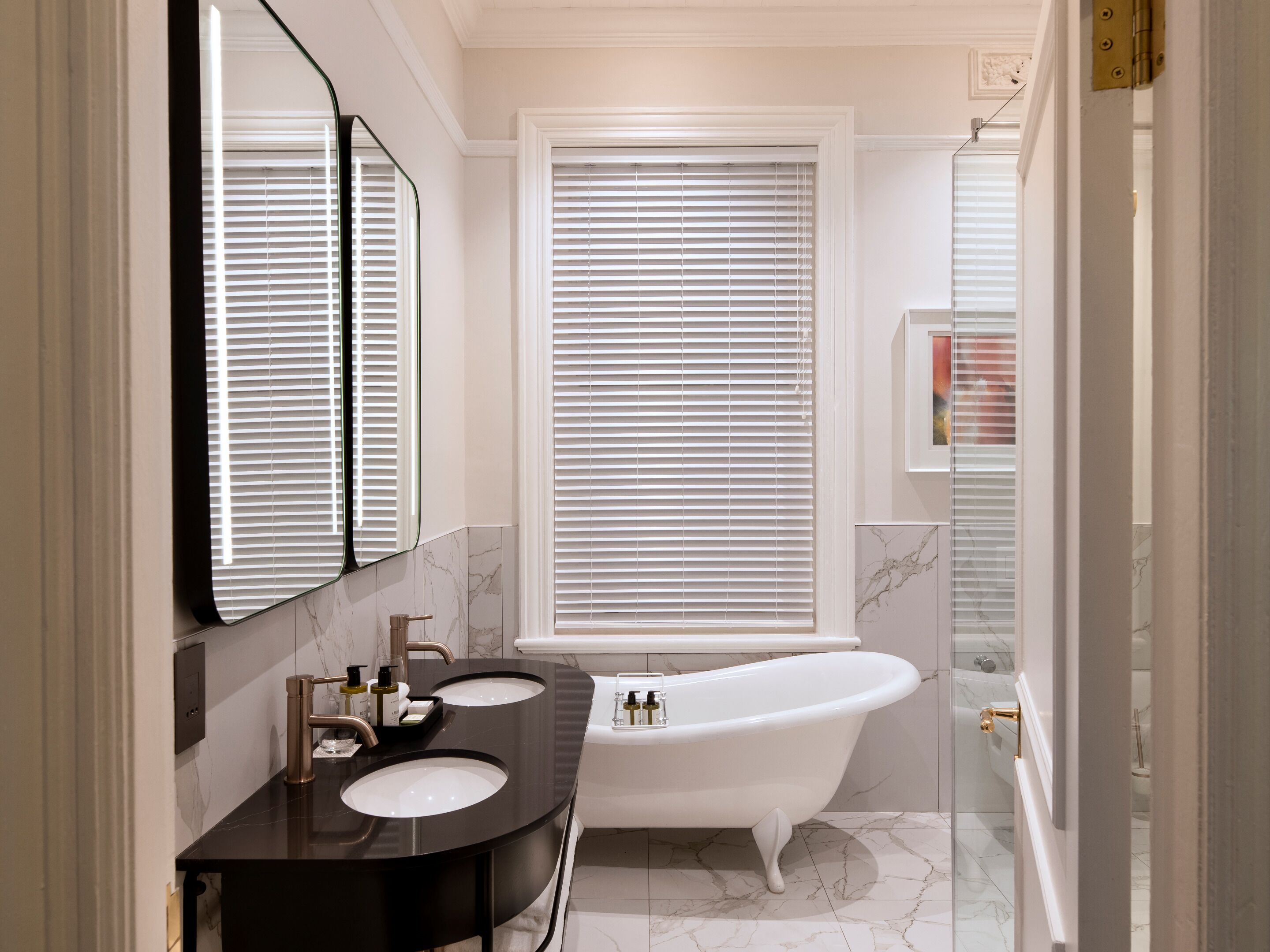 superior room | bathroom | separate bathtub and shower, free toiletries, hair dryer, bathrobes