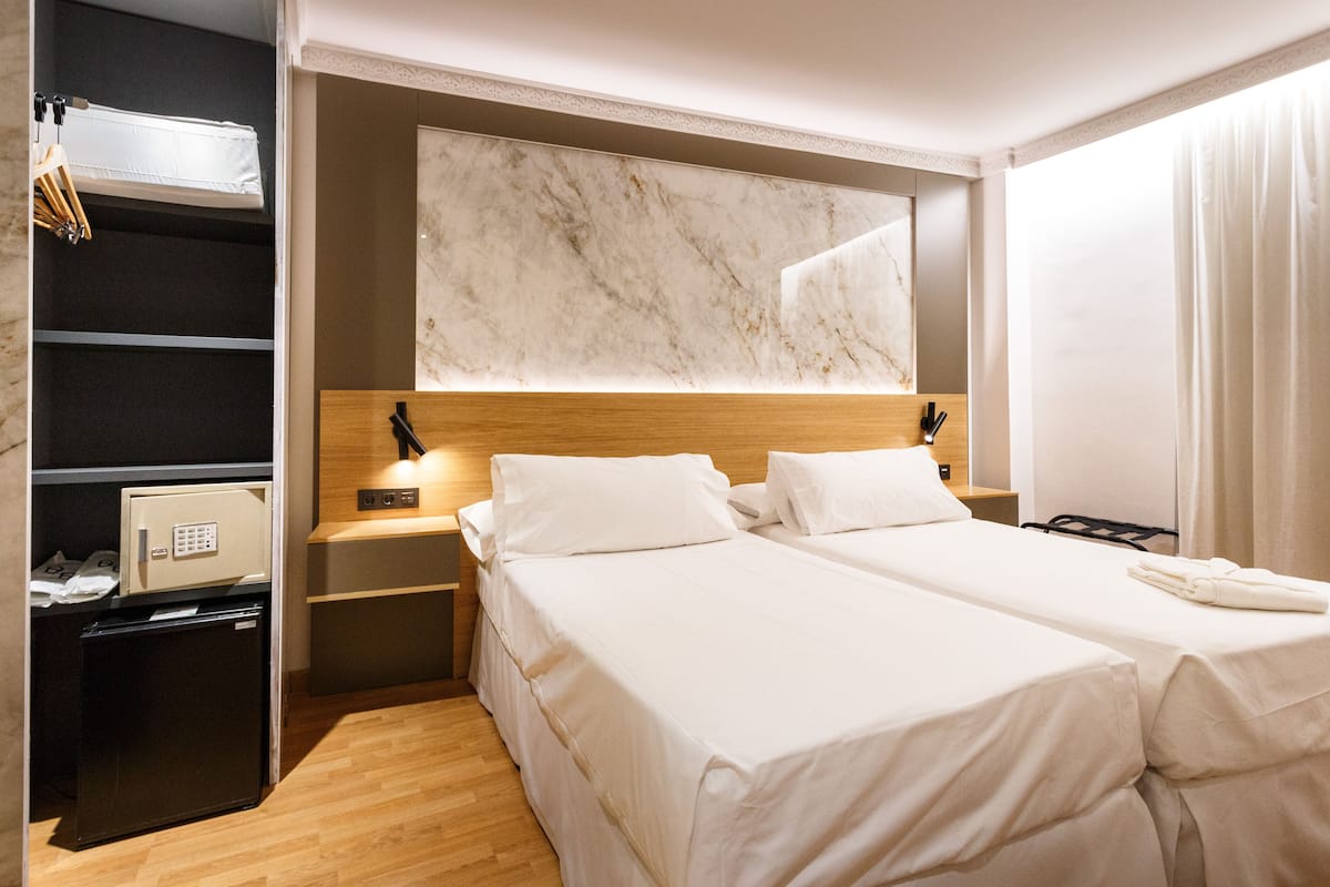 Memory foam beds, minibar, in-room safe, desk