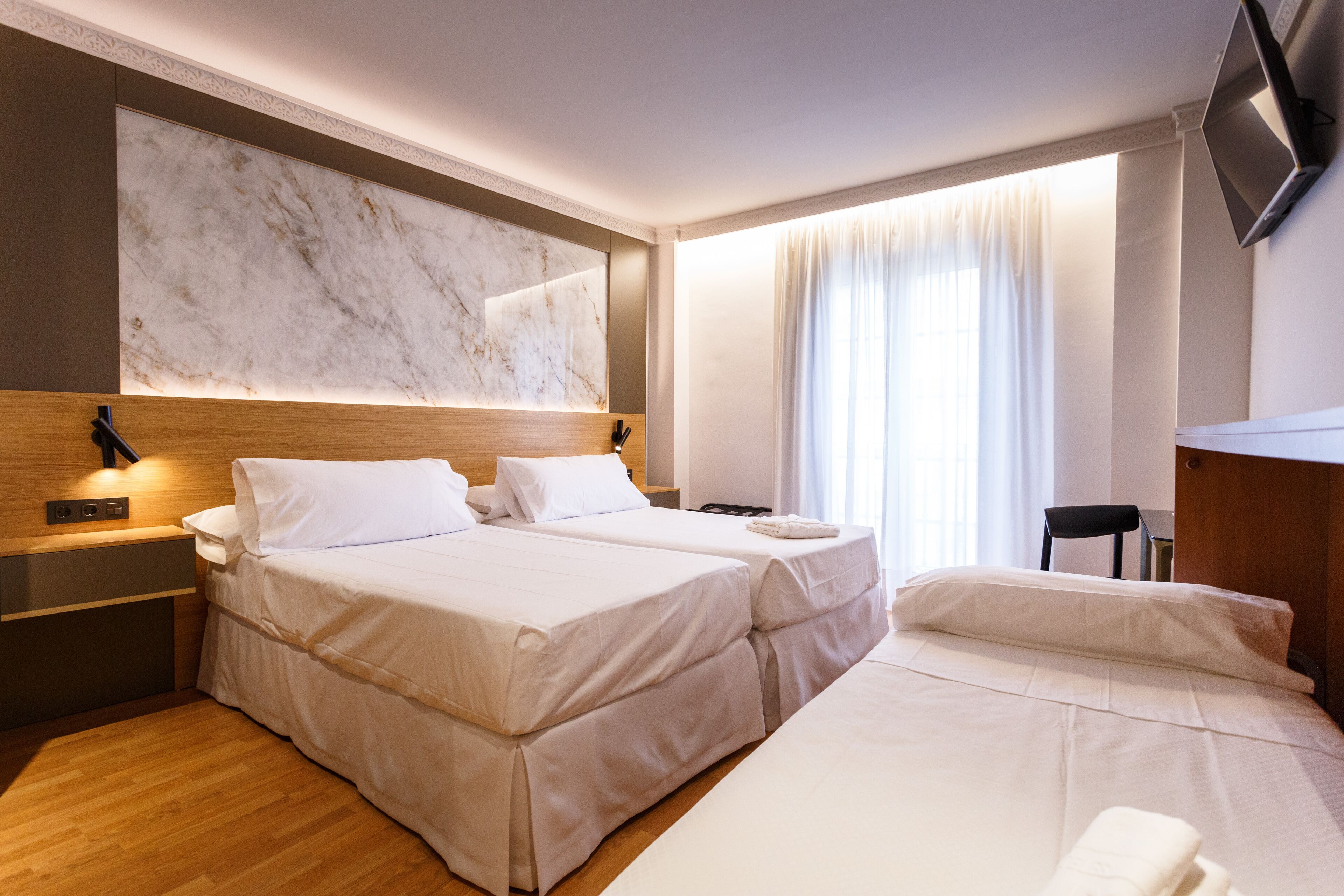 triple room | memory-foam beds, minibar, in-room safe, desk