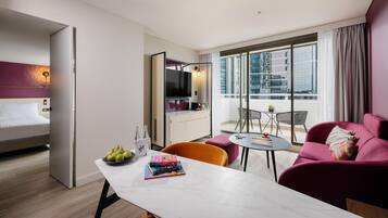Suite, 1 Bedroom, Balcony, City View | Premium bedding, down comforters, pillowtop beds, minibar