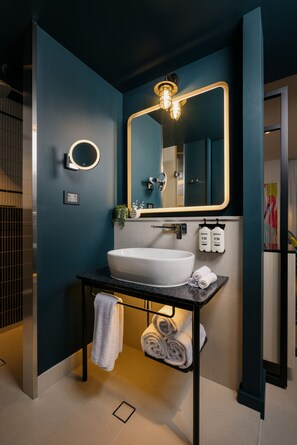 Eco-friendly toiletries, hair dryer, bathrobes, slippers
