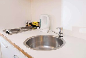 Studio Queen Apartment | Private kitchenette | Fridge, stovetop, coffee/tea maker