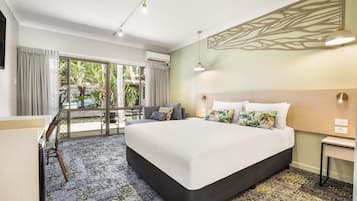 Studio Queen | Desk, iron/ironing board, bed sheets, alarm clocks