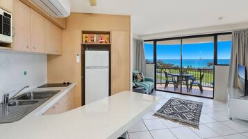 One Bedroom Apartment Mid Level | Living area | TV