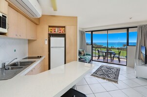 One Bedroom Apartment Mid Level | Living area | TV