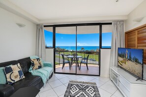 One Bedroom Apartment Mid Level | Living area | TV - Ocean Boulevard (Alexandra Headland)