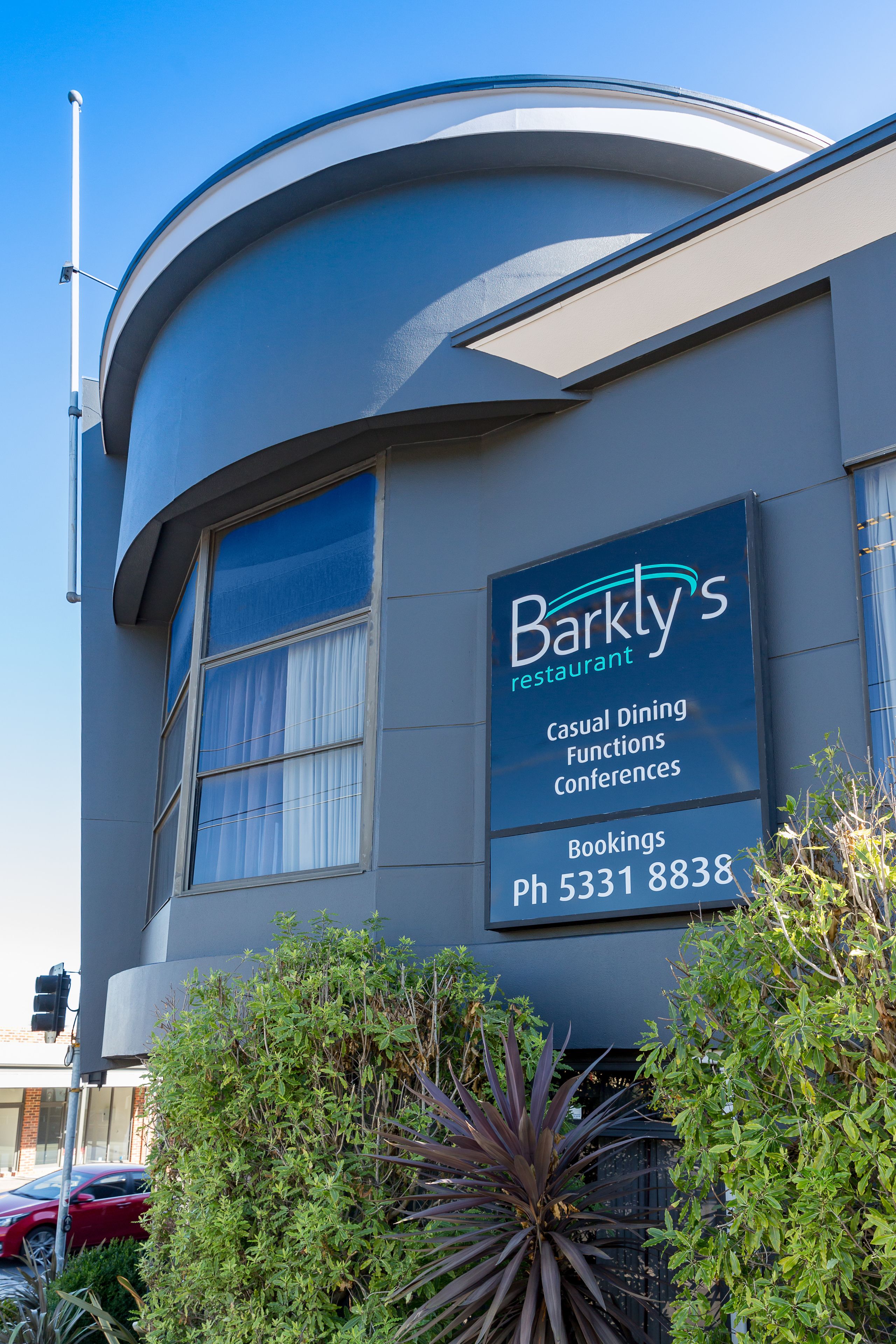 A building with a sign for Barkly's restaurant, indicating it offers casual dining, functions, and conferences.