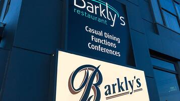 A building with a sign for Barkly's restaurant, indicating it offers casual dining, functions, and conferences.
