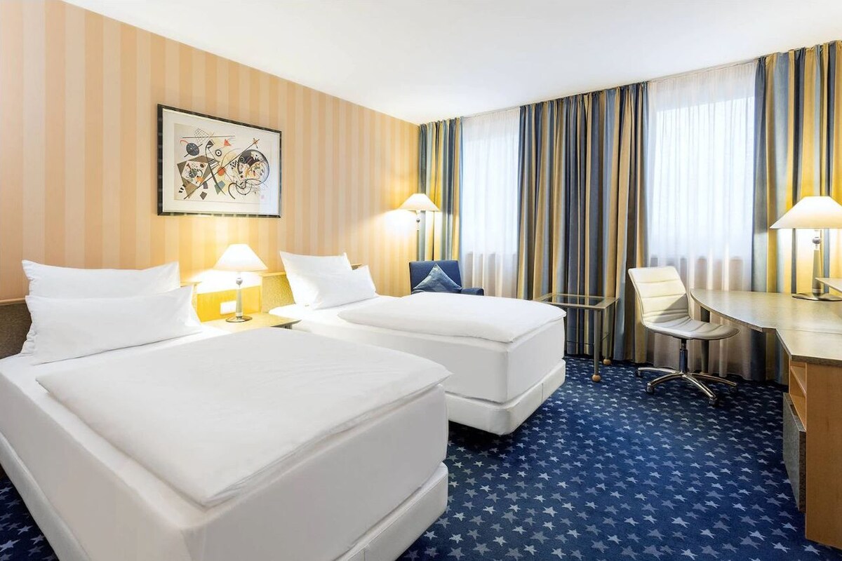 Hypo-allergenic bedding available, pillowtop beds, minibar, in-room safe