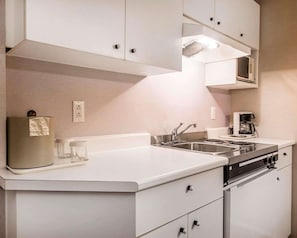 Suite, 2 Queen Beds, Non Smoking | Desk, soundproofing, iron/ironing board, free cribs/infant beds