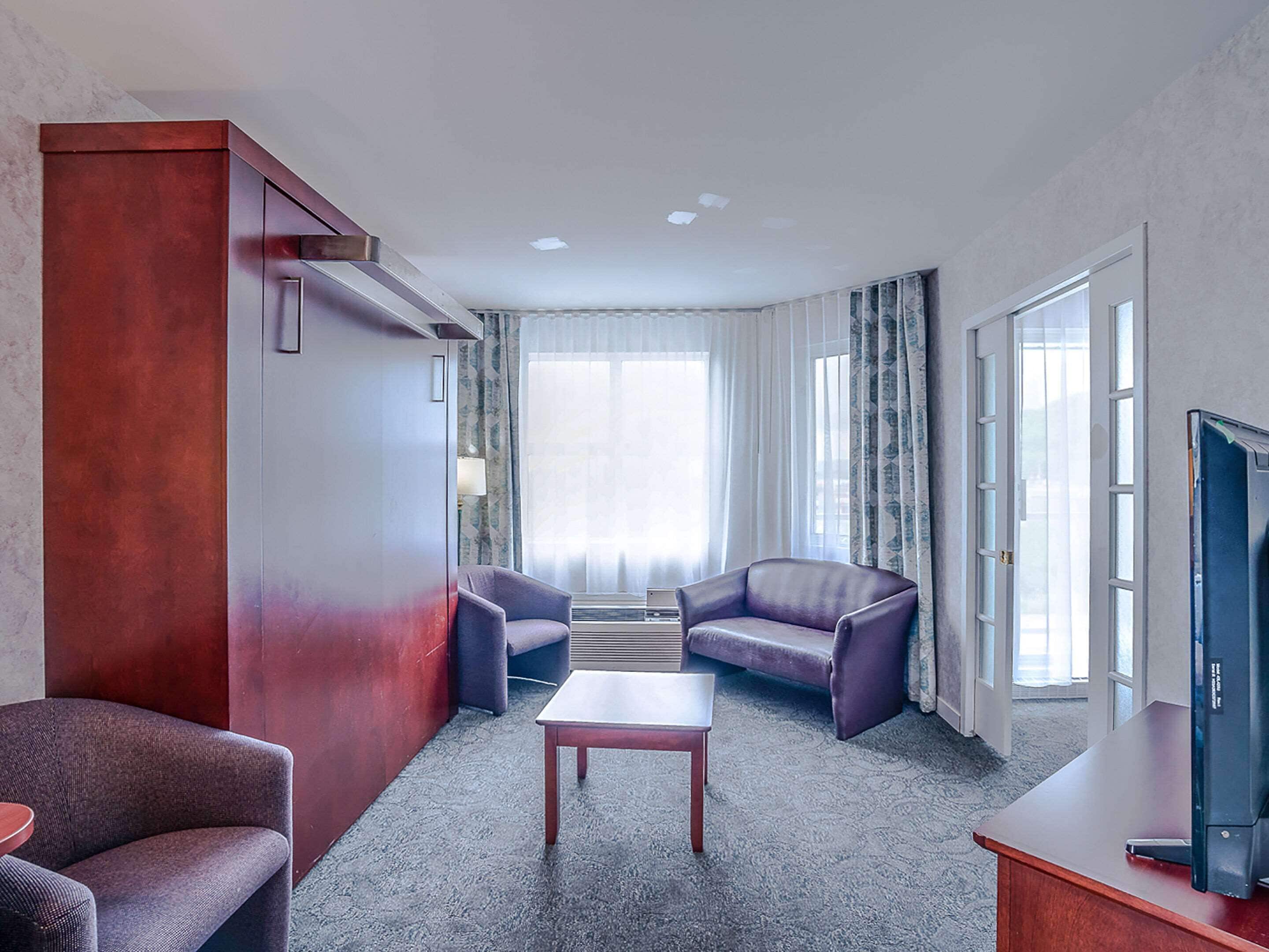 Desk, soundproofing, iron/ironing board, free cribs/infant beds