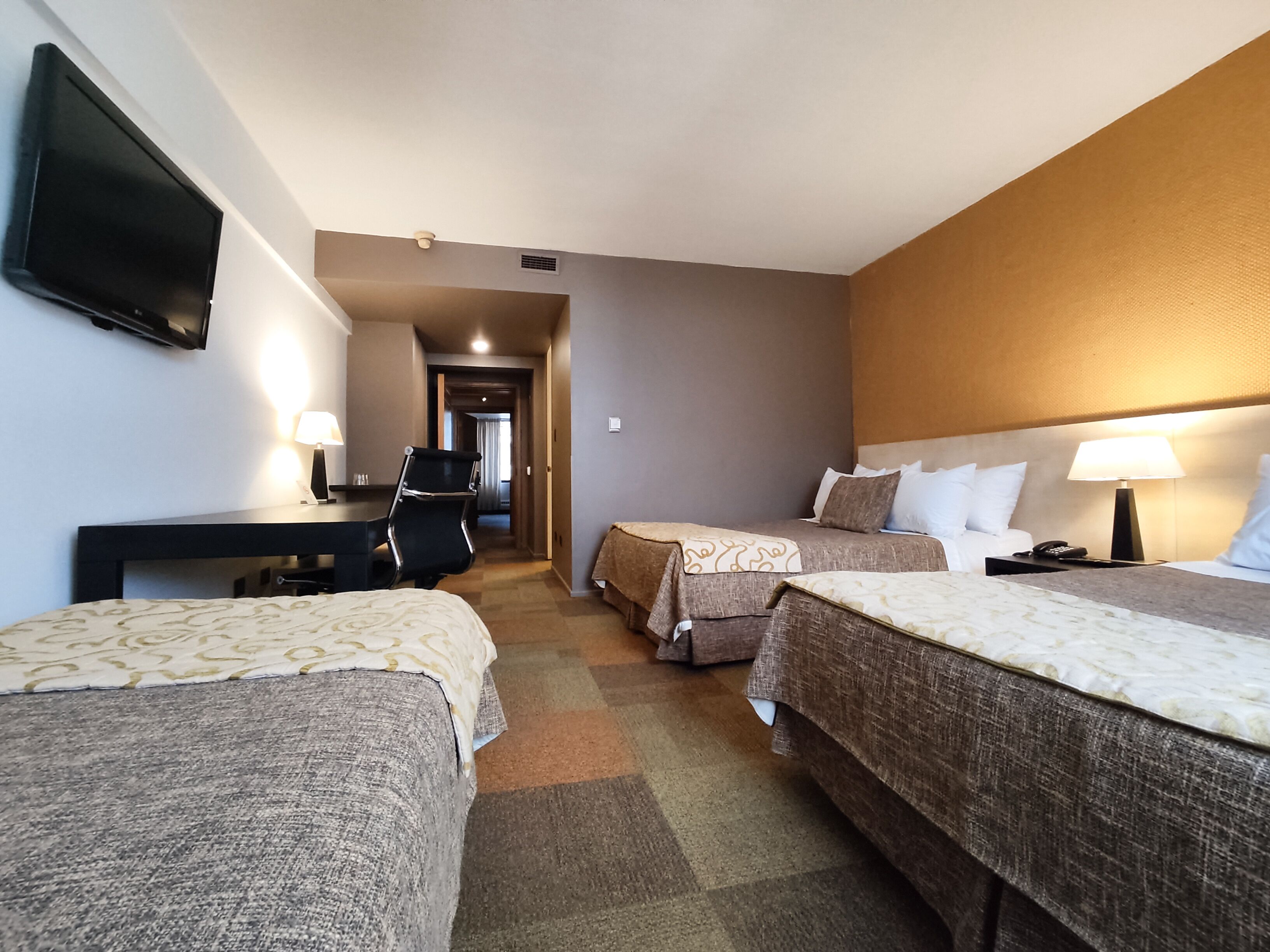 superior triple room | in-room safe, desk, laptop workspace, soundproofing