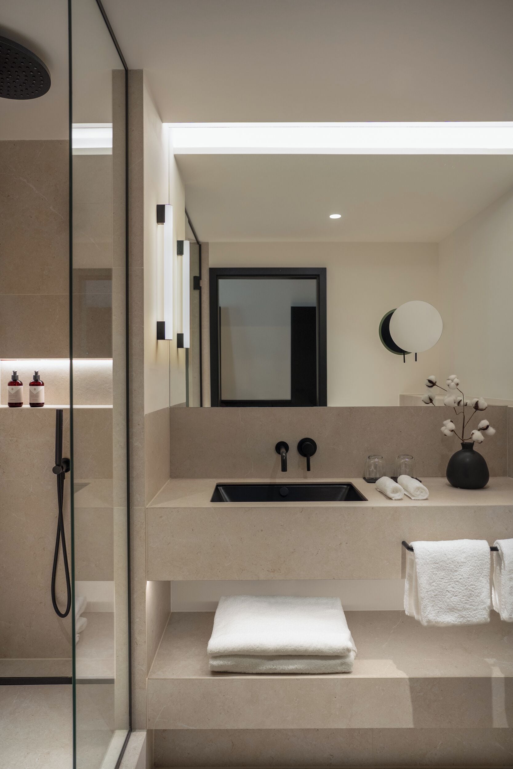Shower, designer toiletries, hair dryer, bathrobes